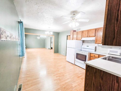 5013 51 Street, Peers, AB - Indoor Photo Showing Kitchen With Double Sink