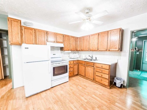 5013 51 Street, Peers, AB - Indoor Photo Showing Kitchen With Double Sink