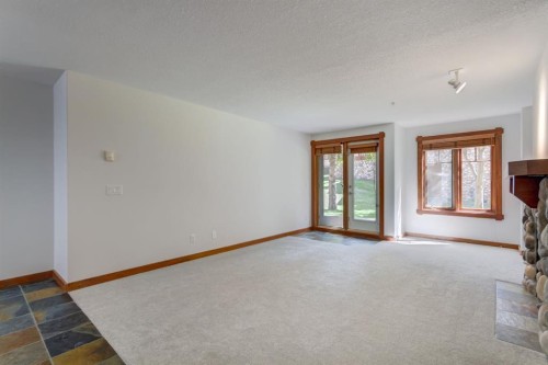 111-170 Crossbow Place, Canmore, AB - Indoor Photo Showing Other Room