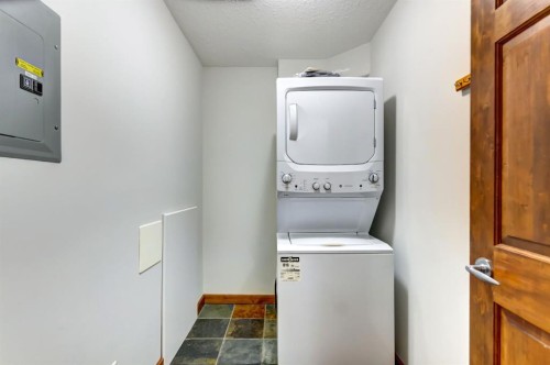 111-170 Crossbow Place, Canmore, AB - Indoor Photo Showing Laundry Room