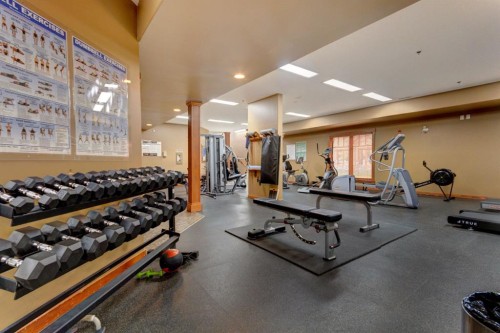 111-170 Crossbow Place, Canmore, AB - Indoor Photo Showing Gym Room