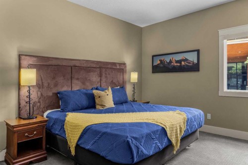 103-191 Kananaskis Way, Canmore, AB - Indoor Photo Showing Bedroom