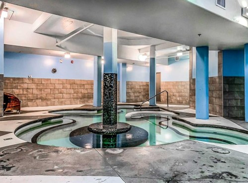 103-191 Kananaskis Way, Canmore, AB - Indoor Photo Showing Other Room With In Ground Pool