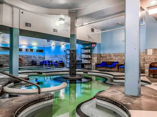 103-191 Kananaskis Way, Canmore, AB - Indoor Photo Showing Other Room With In Ground Pool