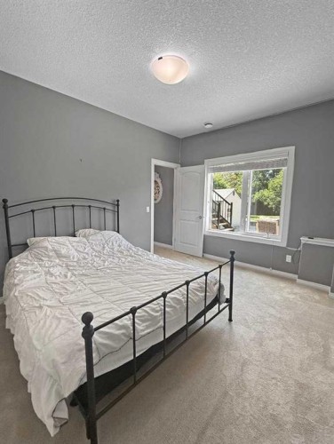 42 Riverstone Road, Whitecourt, AB - Indoor Photo Showing Bedroom