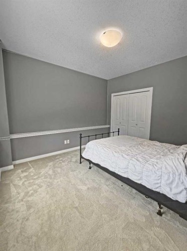 42 Riverstone Road, Whitecourt, AB - Indoor Photo Showing Bedroom