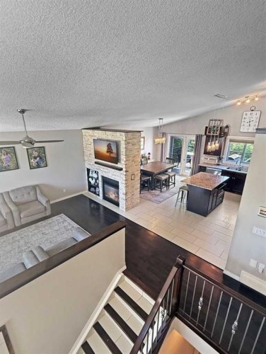 42 Riverstone Road, Whitecourt, AB - Indoor With Fireplace