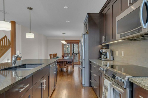 5102-101E Stewart Creek Landing, Canmore, AB - Indoor Photo Showing Kitchen With Double Sink With Upgraded Kitchen