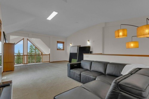 5102-101E Stewart Creek Landing, Canmore, AB - Indoor Photo Showing Living Room