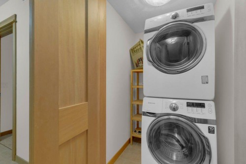 5102-101E Stewart Creek Landing, Canmore, AB - Indoor Photo Showing Laundry Room