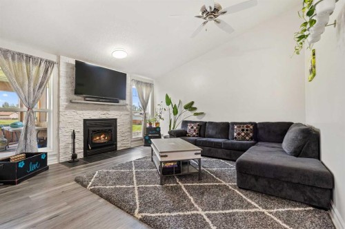 6 Park Circle, Whitecourt, AB - Indoor Photo Showing Living Room With Fireplace
