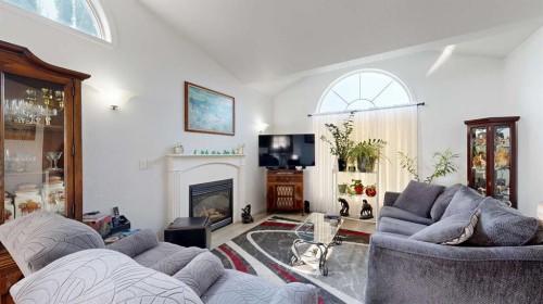 27 Patterson Place, Whitecourt, AB - Indoor Photo Showing Living Room With Fireplace