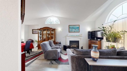 27 Patterson Place, Whitecourt, AB - Indoor Photo Showing Living Room With Fireplace
