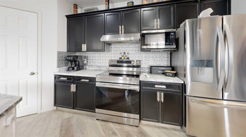 27 Patterson Place, Whitecourt, AB - Indoor Photo Showing Kitchen With Upgraded Kitchen