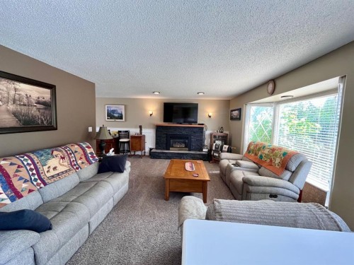 165 Mcpherson Drive, Hinton, AB - Indoor Photo Showing Living Room With Fireplace