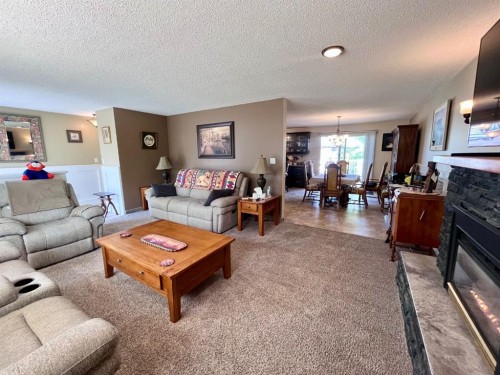 165 Mcpherson Drive, Hinton, AB - Indoor Photo Showing Living Room With Fireplace