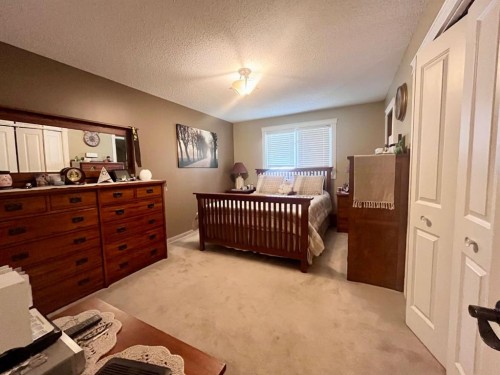 165 Mcpherson Drive, Hinton, AB - Indoor Photo Showing Bedroom