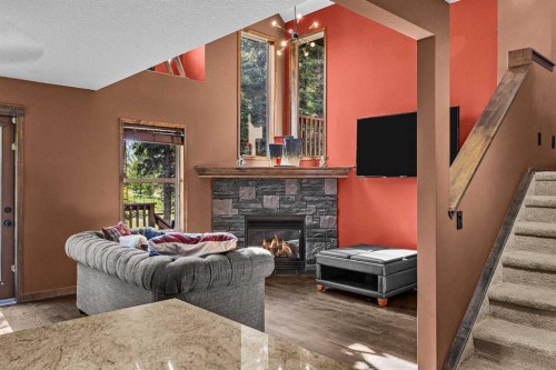 202-108 Armstrong Place, Canmore, AB - Indoor With Fireplace
