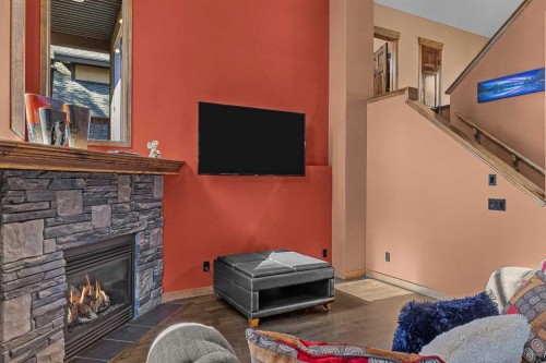 202-108 Armstrong Place, Canmore, AB - Indoor With Fireplace