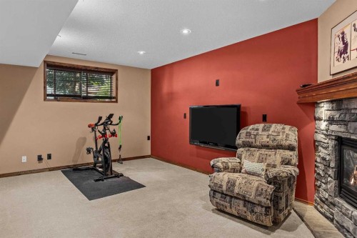 202-108 Armstrong Place, Canmore, AB - Indoor With Fireplace