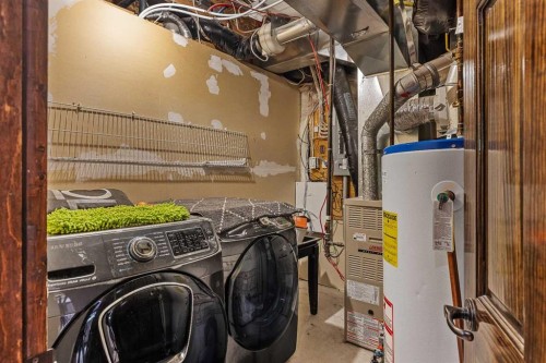 202-108 Armstrong Place, Canmore, AB - Indoor Photo Showing Laundry Room