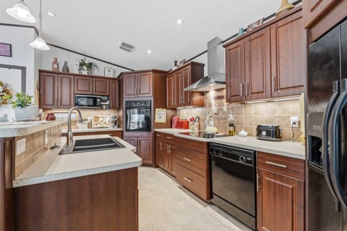 34 Gunderson Drive, Whitecourt, AB - Indoor Photo Showing Kitchen With Double Sink