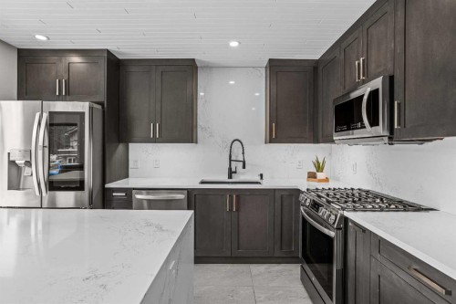 610 Larch Place, Canmore, AB - Indoor Photo Showing Kitchen With Stainless Steel Kitchen With Upgraded Kitchen