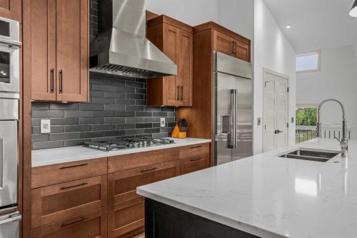 401 Stewart Creek Close, Canmore, AB - Indoor Photo Showing Kitchen With Double Sink With Upgraded Kitchen