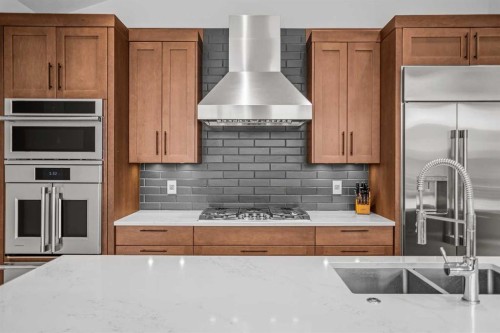 401 Stewart Creek Close, Canmore, AB - Indoor Photo Showing Kitchen With Double Sink
