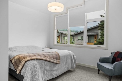 401 Stewart Creek Close, Canmore, AB - Indoor Photo Showing Bedroom