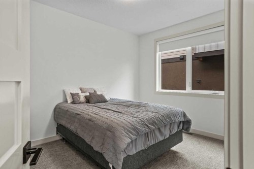 401 Stewart Creek Close, Canmore, AB - Indoor Photo Showing Bedroom