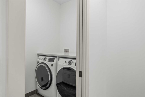 401 Stewart Creek Close, Canmore, AB - Indoor Photo Showing Laundry Room
