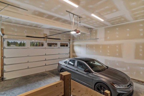 401 Stewart Creek Close, Canmore, AB - Indoor Photo Showing Garage
