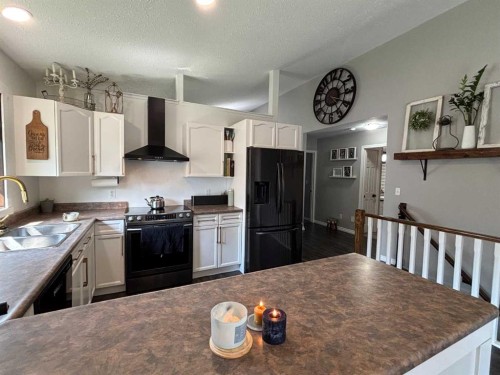 26 Olson Crescent, Whitecourt, AB - Indoor Photo Showing Kitchen With Double Sink