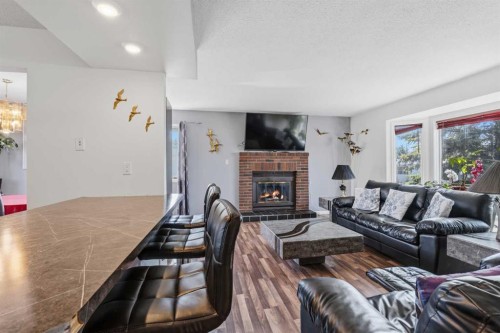 22 Hillside Avenue, Swan Hills, AB - Indoor Photo Showing Living Room With Fireplace