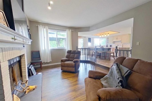 4609 Champagne Drive, Athabasca, AB - Indoor Photo Showing Living Room With Fireplace