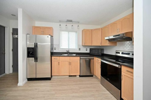 3007 47 Avenue, Athabasca, AB - Indoor Photo Showing Kitchen With Double Sink