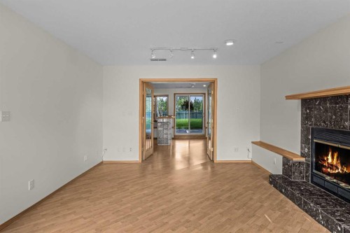 522 Grotto Road, Canmore, AB - Indoor Photo Showing Other Room With Fireplace