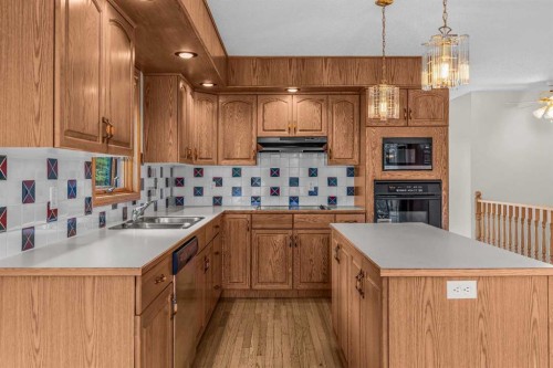 522 Grotto Road, Canmore, AB - Indoor Photo Showing Kitchen With Double Sink