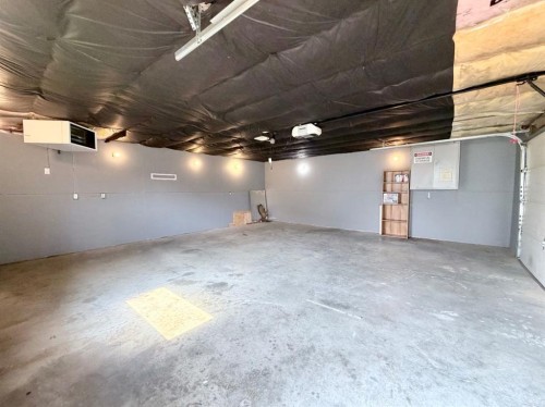 57 Atkinson Crescent, Whitecourt, AB - Indoor Photo Showing Garage