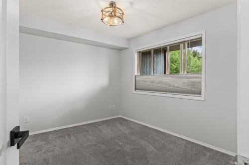 120-300 Palliser Lane, Canmore, AB - Indoor Photo Showing Other Room