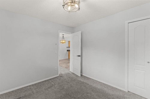 120-300 Palliser Lane, Canmore, AB - Indoor Photo Showing Other Room