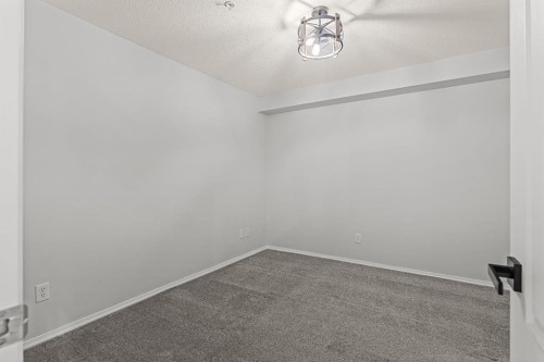 120-300 Palliser Lane, Canmore, AB - Indoor Photo Showing Other Room