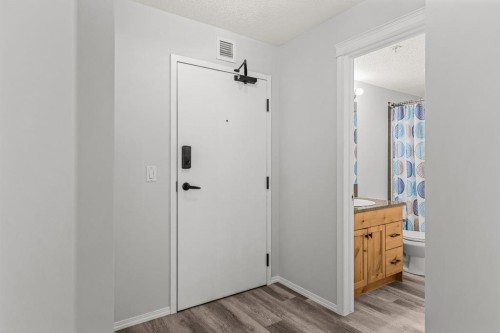 120-300 Palliser Lane, Canmore, AB - Indoor Photo Showing Other Room