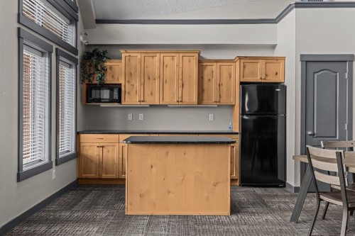 120-300 Palliser Lane, Canmore, AB - Indoor Photo Showing Kitchen