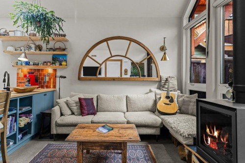 A And B-132 Rundle Crescent, Canmore, AB - Indoor Photo Showing Living Room With Fireplace