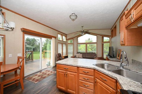 167 Shank Drive, Island Lake South, AB - Indoor Photo Showing Kitchen With Double Sink