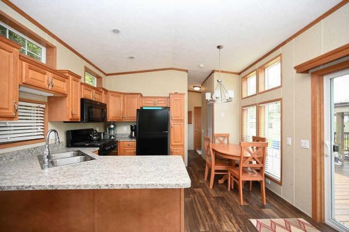 167 Shank Drive, Island Lake South, AB - Indoor Photo Showing Kitchen With Double Sink