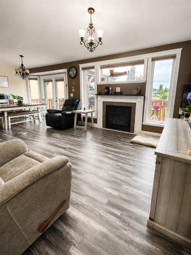 66 Cedar Heights, Whitecourt, AB - Indoor Photo Showing Living Room With Fireplace