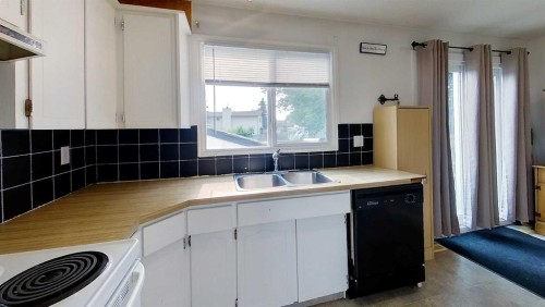 5735 Westhaven Drive, Edson, AB - Indoor Photo Showing Kitchen With Double Sink